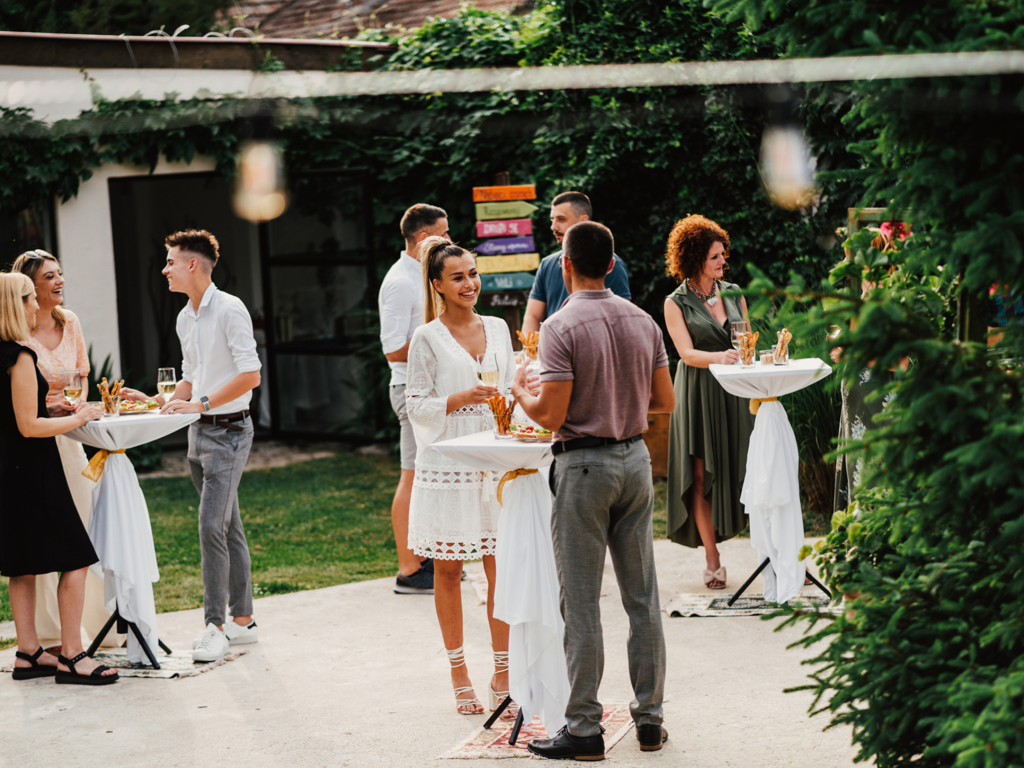 Guests mingling at engagement party