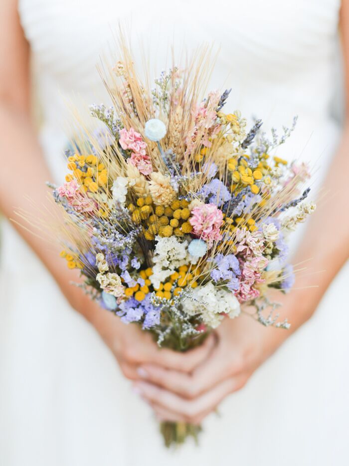 Rustic bridal bouquet made of grains and grasses