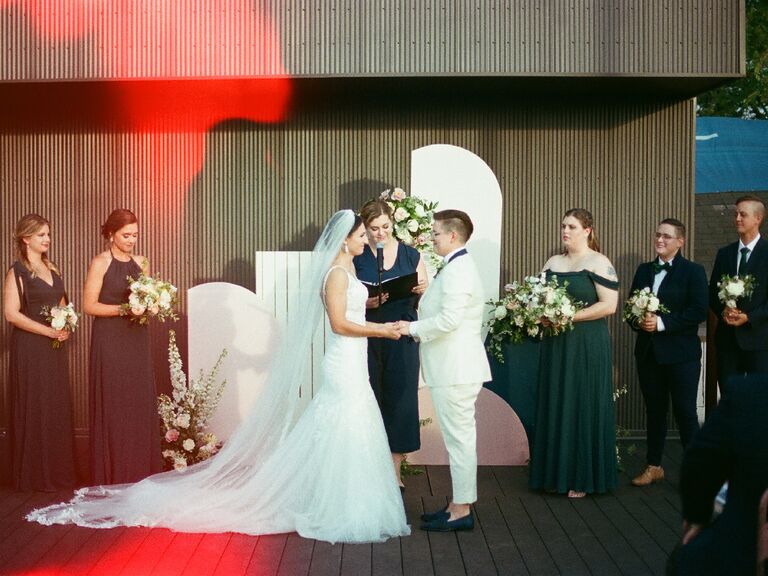 Film wedding photography featuring couple exchanging vows at altar