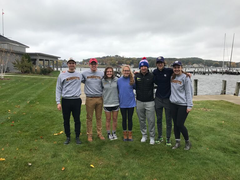 Connor and Kara met on the Marquette University sailing team in 2016. Connor joined because his grandpa and dad were sailors and Kara joined she heard they were a "sailing team with a drinking problem". C & K took their first picture together at the Emma Biagoni regatta - the first race they attended together!

In winter of 2018, C & K talked the night away at Commodore's, the sailing formal. Kara got home that night and gushed to her roommates about how she'd met the love of her life - the perfect man! After some online stalking, they realized he was likely in another relationship... Kara was crushed. 

Fast forward to April 2018 and Connor sends a message in their sailing group. His roommate was caught in the middle of a tomato exchange gone wrong at the campus grocery store -  the delivery man was going to throw away a whole box when he ran into Jason. Jason and Connor had at least 50 tomatoes they needed to get rid of, and Kara is a girl who LOVES tomatoes.
Kara went over to Connor's apartment that day accompanied by her good friend John. Knowing Kara was coming over, Connor was excited because he had a pretty big crush on her. But when she showed up with her friend John, Connor assumed they were together and was crushed. **Please note that neither C or K were in relationships at the assumed times. These two were just too nervous to talk to each other!