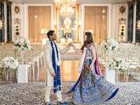 Couple holding hands in the beautiful ceremony space