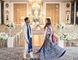 Couple holding hands in the beautiful ceremony space