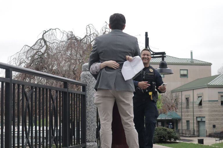 For their 6 month anniversary, Nathan asked his buddy Jarren who is a police officer to "Arrest" Mikayla with a warrant that says "Wanted for Marriage- Mikayla Vega" with her favorite picture on it! Then Nathan popped the question. Their friend Tom (best man) is also disguised as a hobo to take the pictures seen here. 