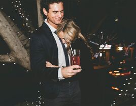 Couple hugging at their anniversary party