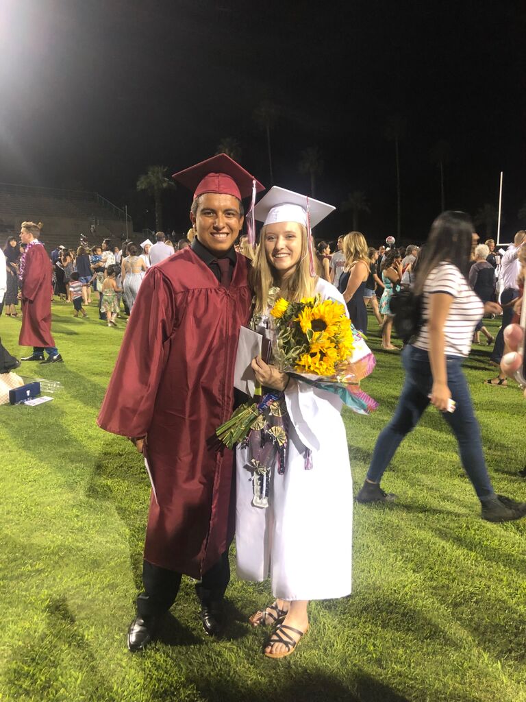 Graduating high school together.