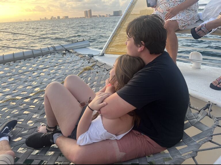 Our first vacation together in Florida. We are watching the dolphins in this picture and grooms mom luckily snapped a picture of us