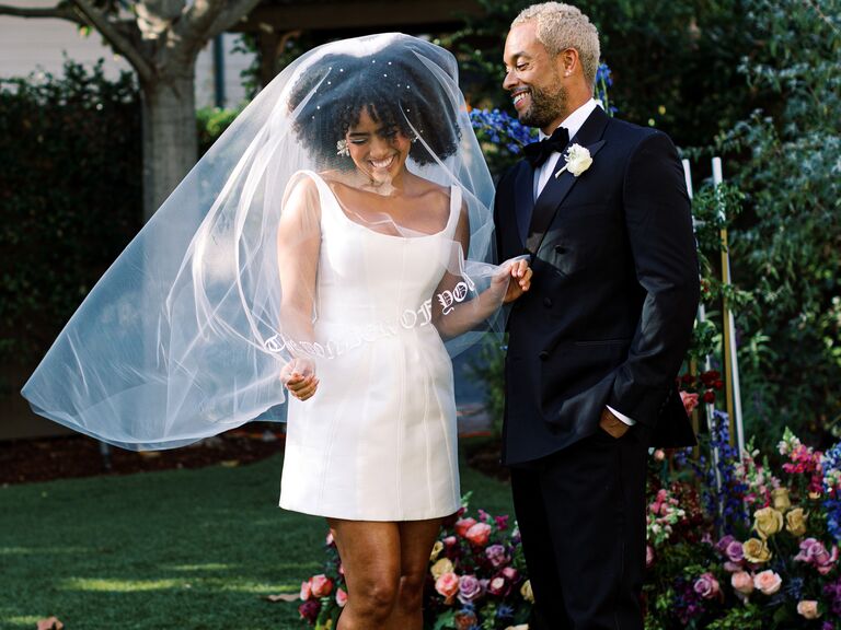 bride and groom smiling