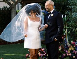 bride and groom smiling