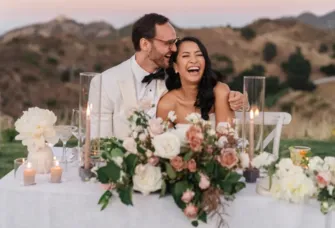 Couple laughing on their wedding day