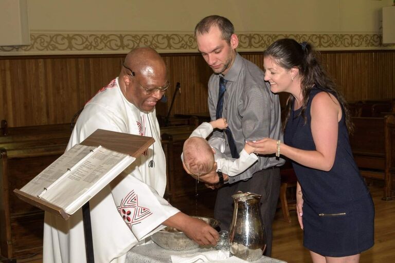 Kristen and Tyler become Godparents to Lomac Alomaa 