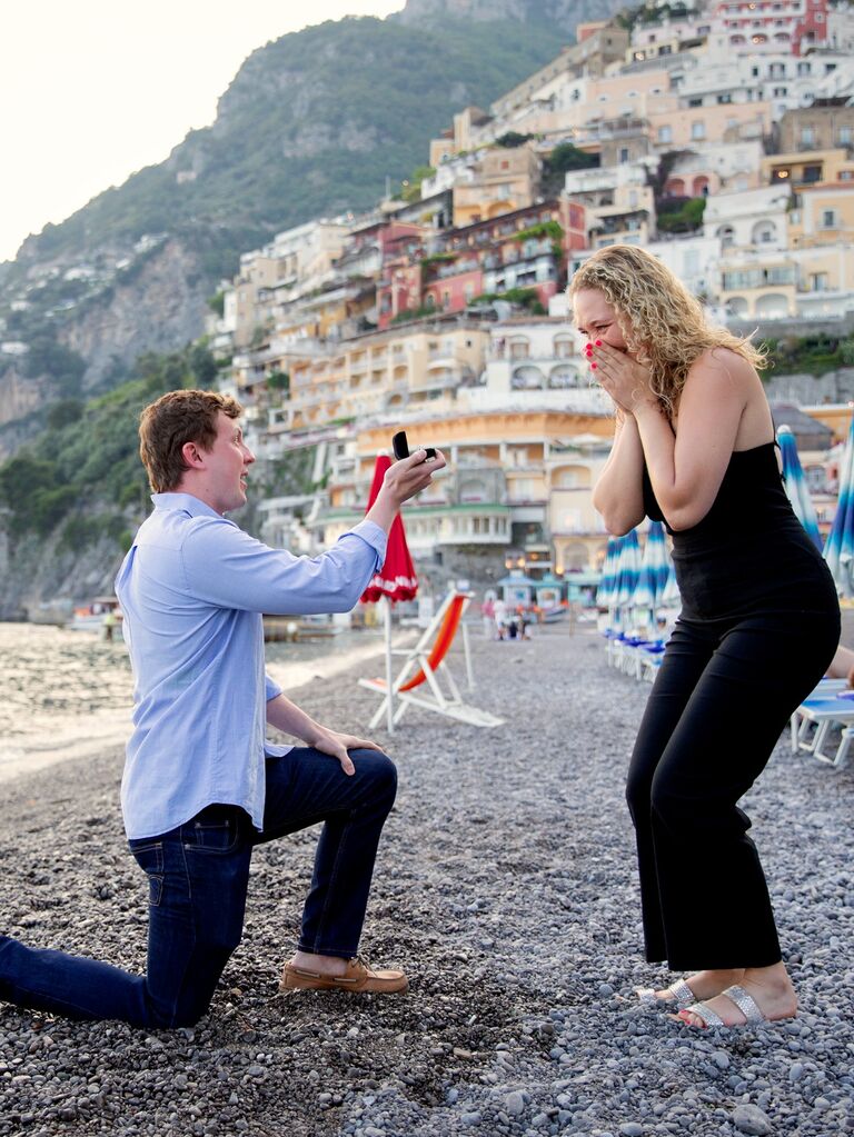 Nine years after they started dating, Madi and Anthony enjoyed their first vacation abroad together in Italy – specifically on this day in Positano. Anthony had long pre-arranged this day as “the day”, organizing a local photographer in advance. A little before sunset, Anthony popped the question! 