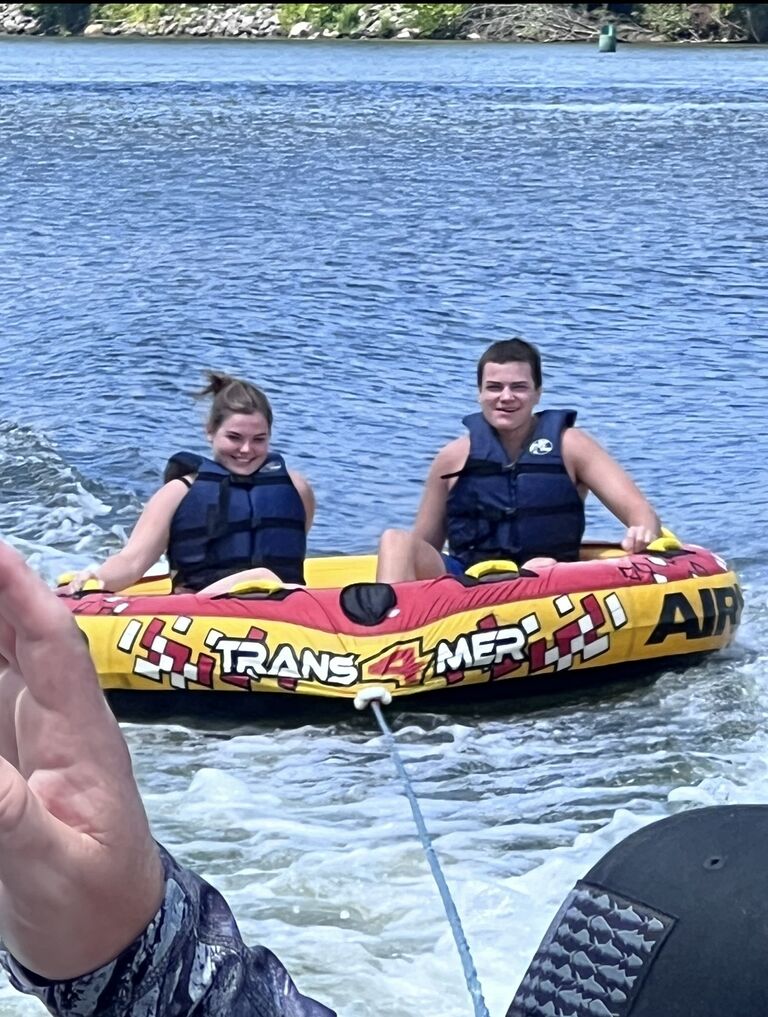 The brides first time tubing with the grooms family