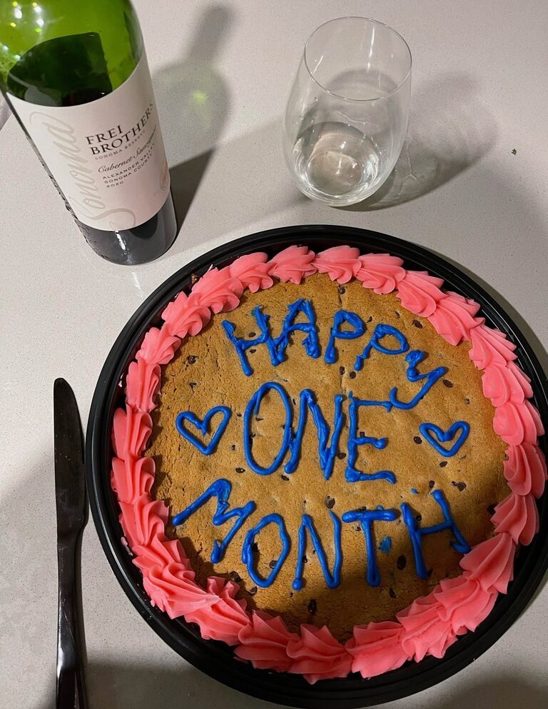 Celebrated our one month anniversary with cookie cake and a bottle of wine! 