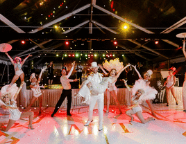 Bride and groom doing a wedding dance at their reception.