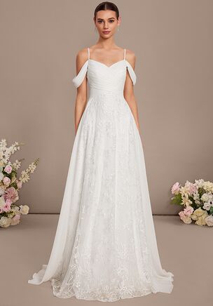 Fall in love with the JJ's House Amarys A-line Lace Wedding Dress! A timeless and elegant design crafted to make your dream wedding a reality. Shine with confidence as you walk down the aisle.