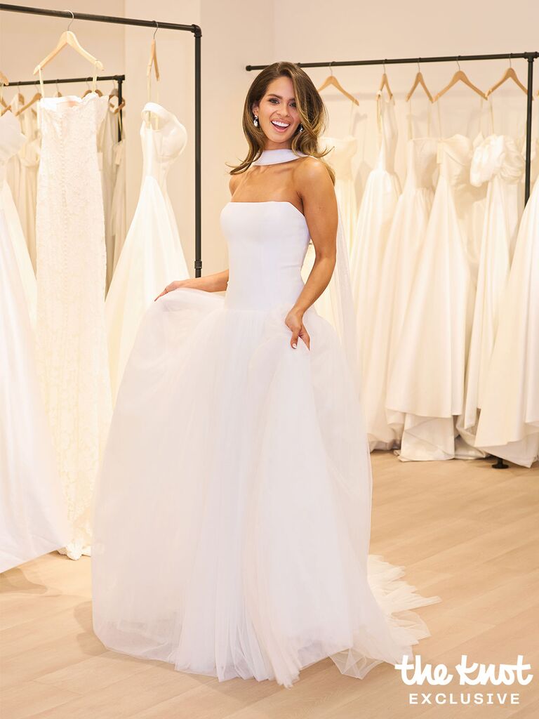 Kelsey Anderson wearing a strapless drop-waist wedding dress with a tulle skirt