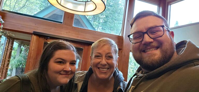 Shelby, Chris Koch (Mother of the Groom), and Joshua visit Skamania Lodge and are instantly captivated by its charm. Enchanted by the stunning setting, they waste no time and book the venue the very next day to secure their perfect spot for the following winter.