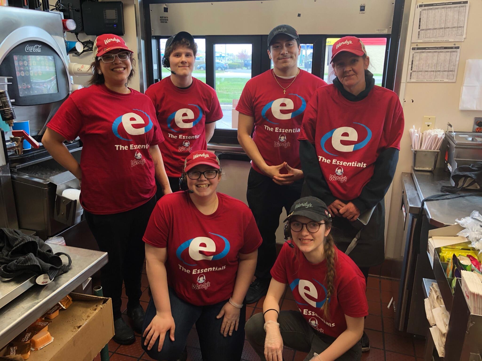 Rachel and Octavio met at Wendy's in Bowling Green. Octavio was a manager who was transferred to Rachel's store due to lack of managers during the Covid Pandemic. In this photo the crew were given matching T-Shirts that said  "the essentials" for working through the pandemic. 