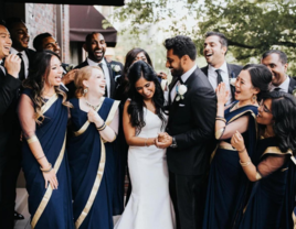 Bride and groom with wedding party at Indian wedding planned by Hoffwell Living in Seattle, Washington