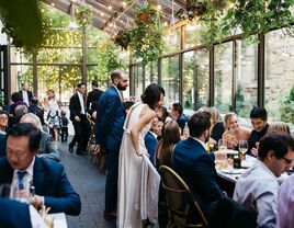 Couple talking to their guests in the restaurant wedding venue