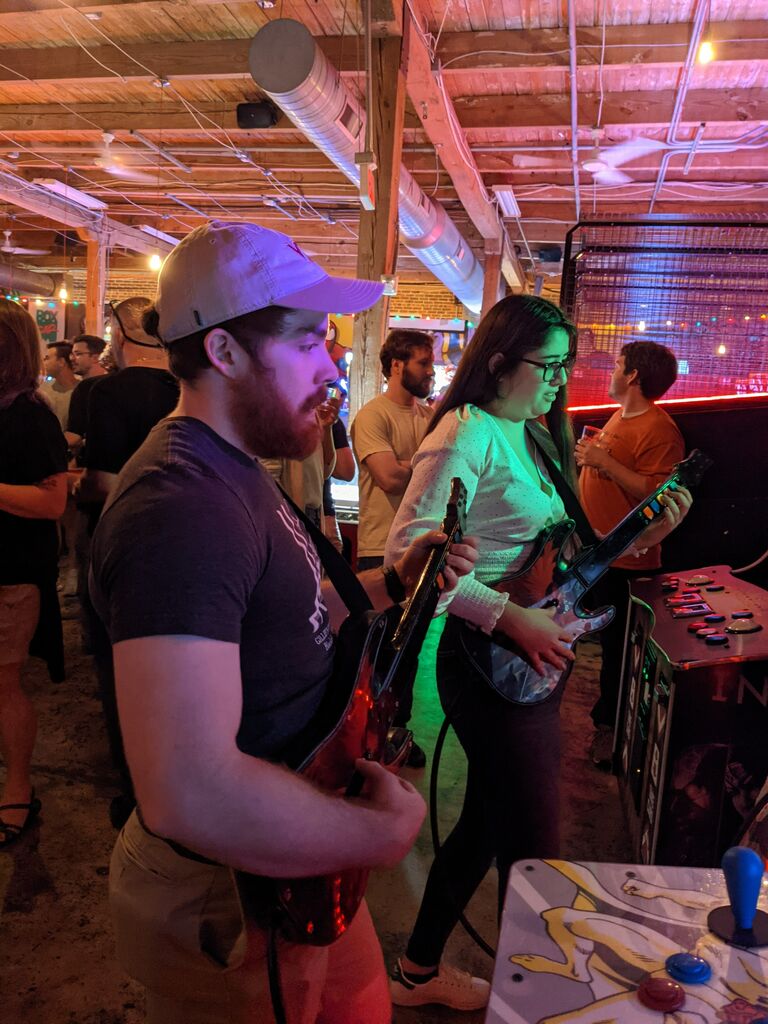 Mary Lissy (friend) came to visit Emma and Sean in Raleigh. Sean challenged her to a guitar hero battle. Poor ML never stood a chance. 