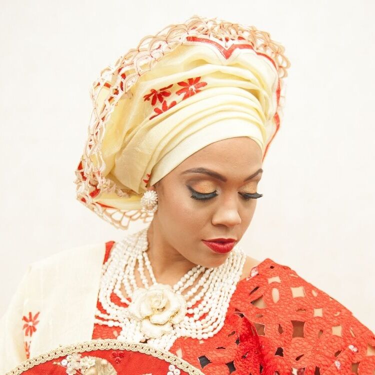 Nigerian bride with yellow gele head tie