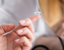 contact lens on finger