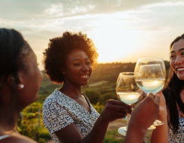 Friends enjoying wine together on classy bachelorette