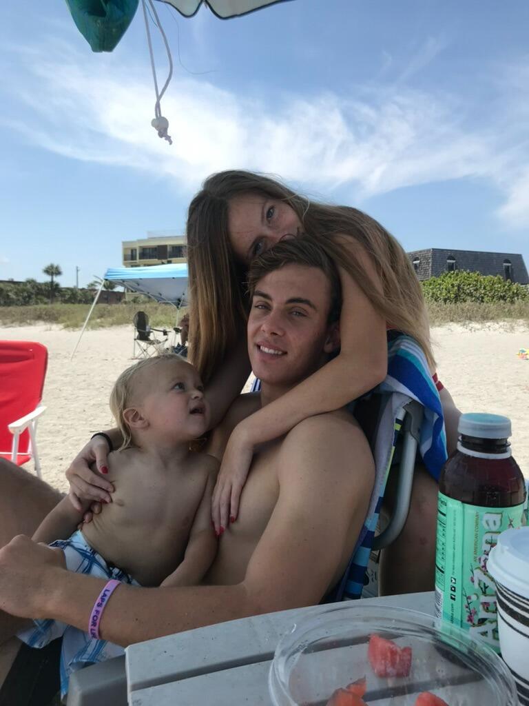 Emma, Brett, and their nephew Merrik at the beach!
