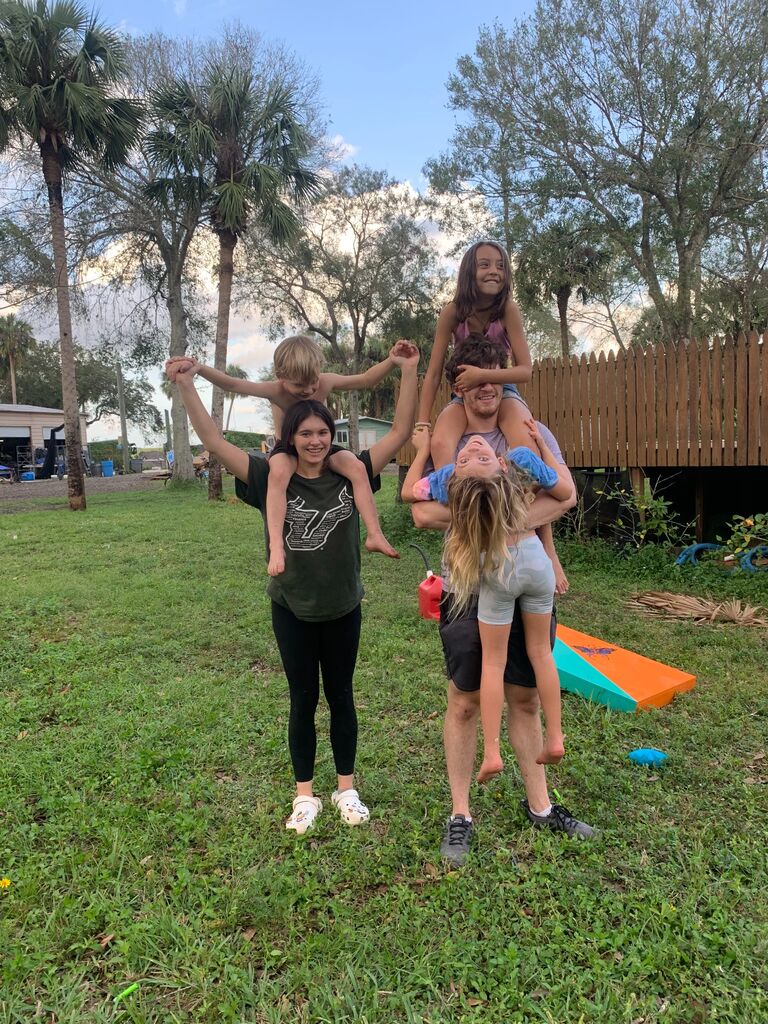 Our first Thanksgiving, spent with Jacqueline's family! After this photo, they took her dad's 4x4 out for a drive and almost rolled it down a hill on accident. 