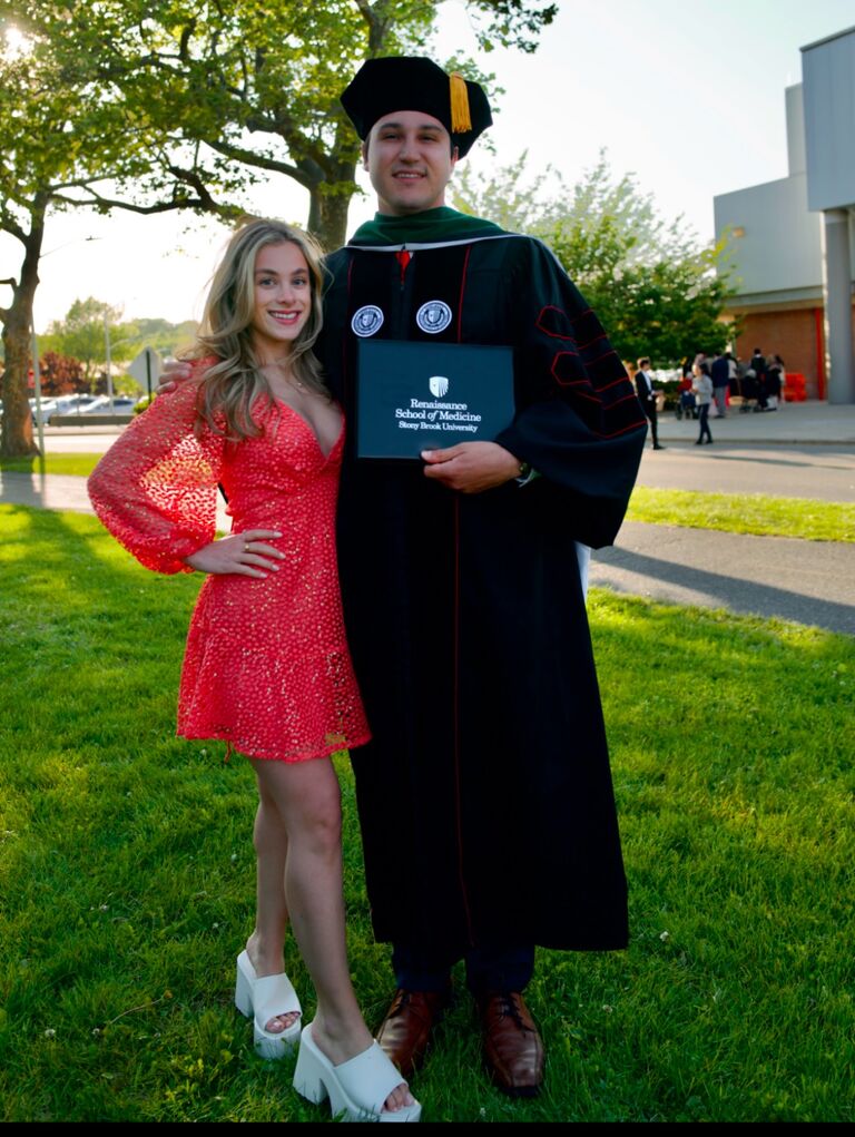 Alex graduates from medical school
