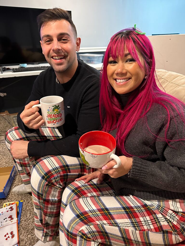 Christmas at my sisters house with our tradition of matching PJs and hot cocoa in cups specially picked for our personalities!