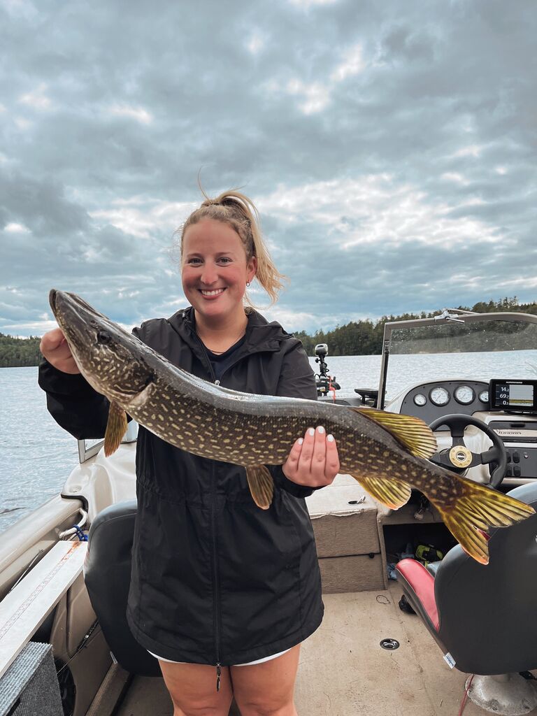 Kailey hooks into & catches her first Northern Pike on Lower Saranac Lake, a 31" Northern no less!