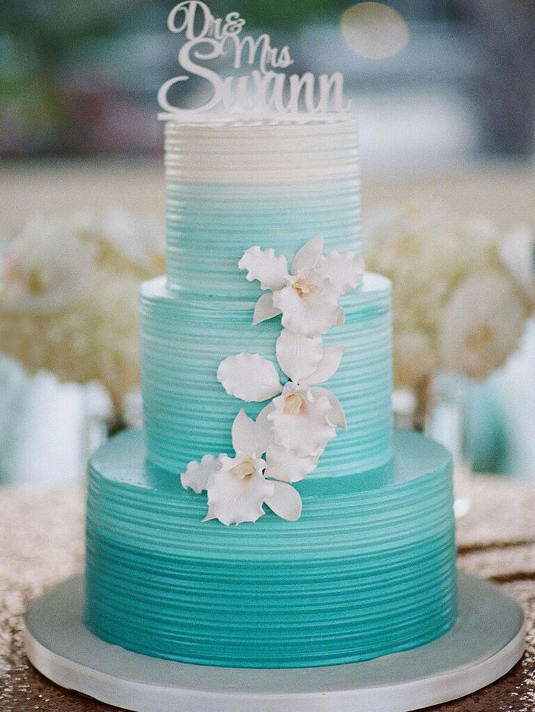 Aqua blue ombré beach-themed wedding cake