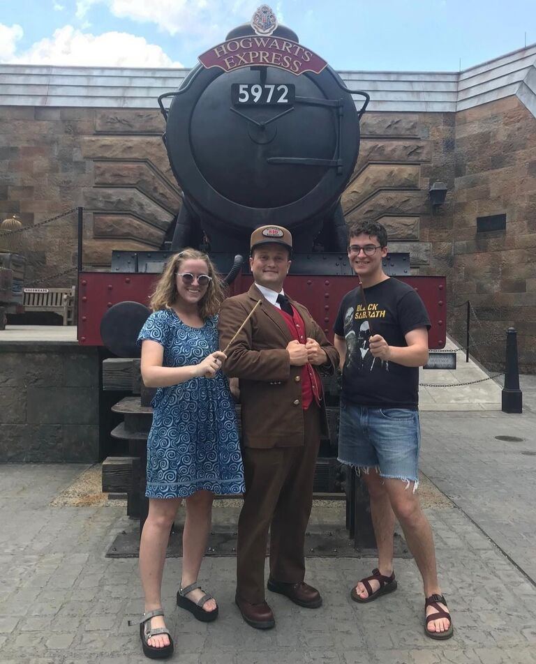 The couple goes on vacation to Universal Studios. 