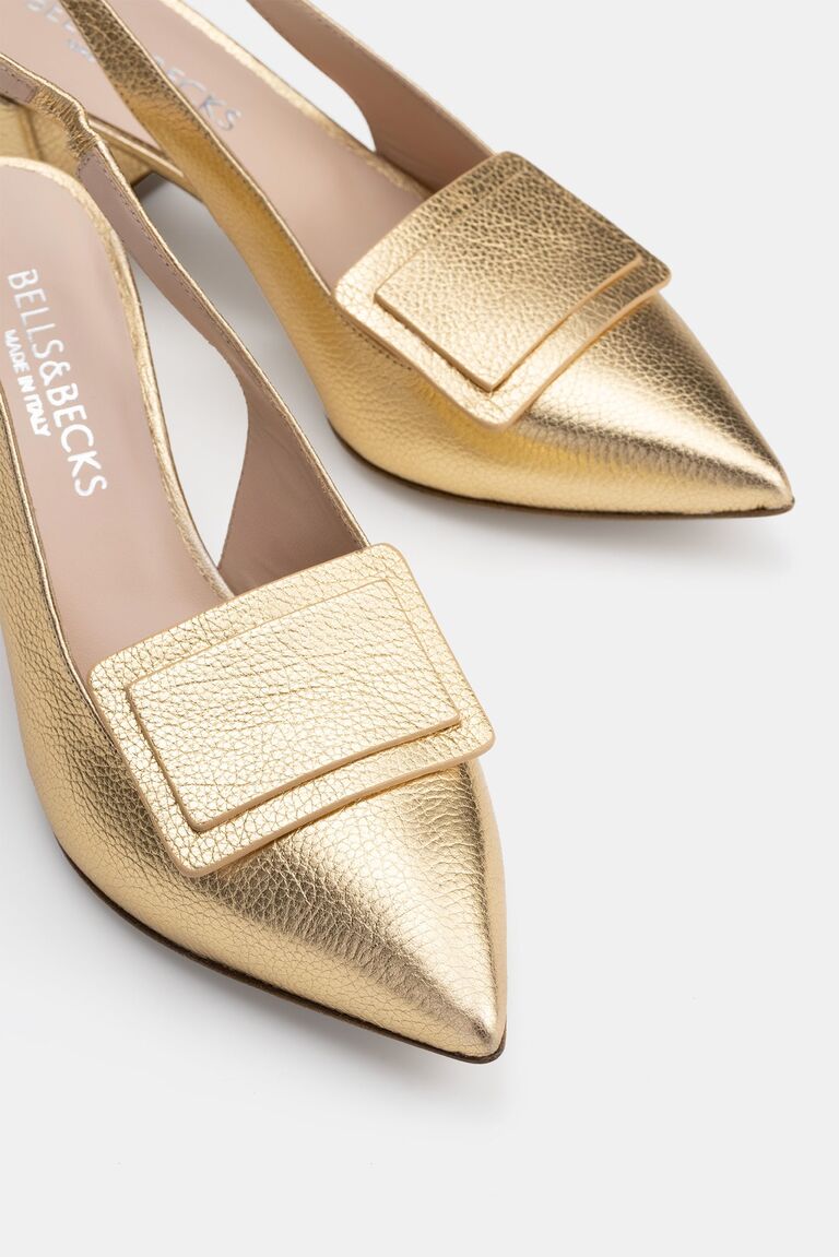 Soft gold leather shoes with a pointed toe and a low heel. 