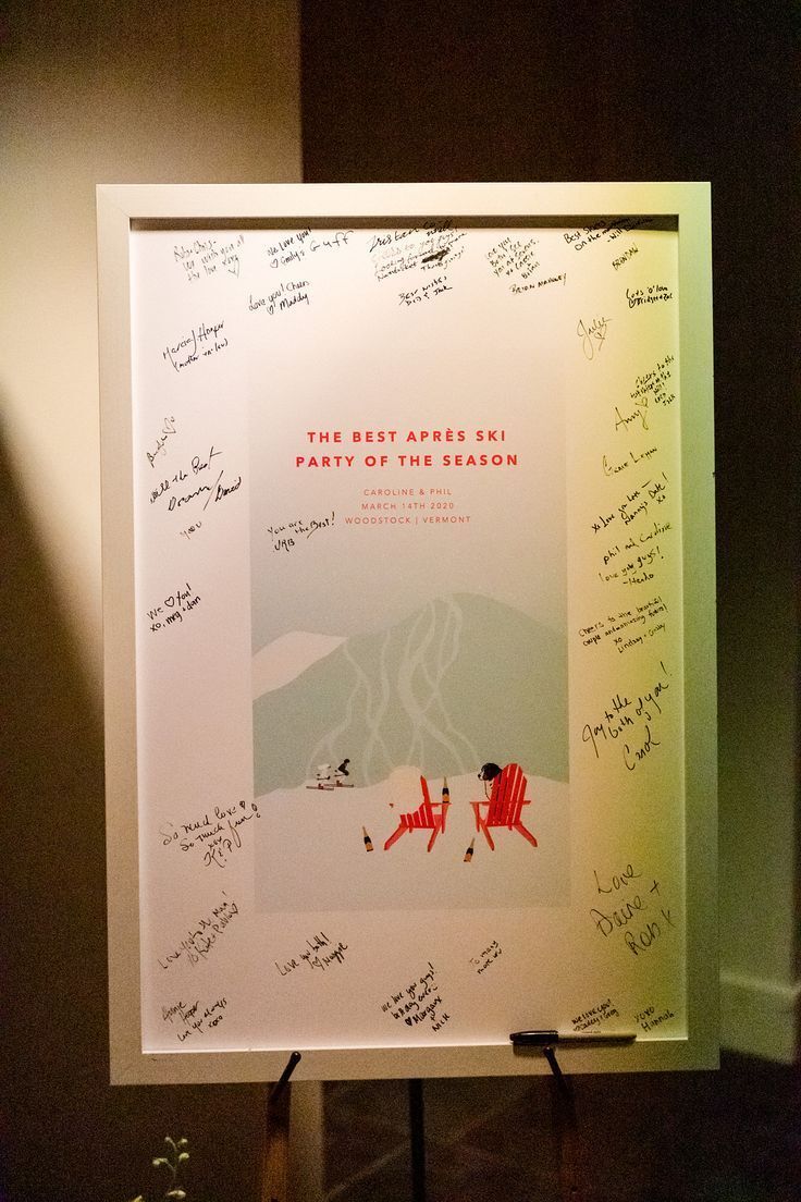 Ski-themed guest book sign on easel