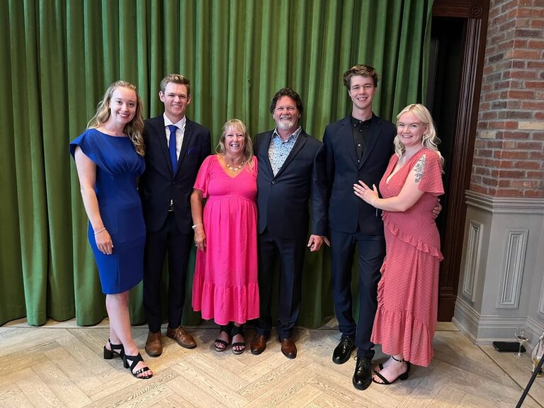 Family photo at the wedding before dinner.
