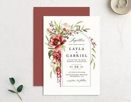 Burgundy watercolor florals bordering gold arch framing event details on white background