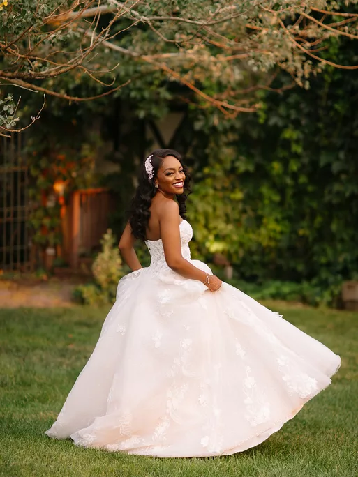A bride wearing a gorgeous gown from The Bridal Collection