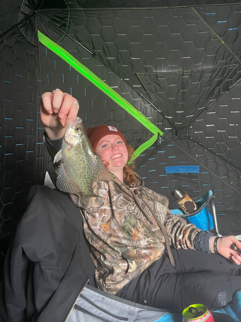That winter Chris introduced Emma to ice fishing and they both found something they loved to do in the winter together. Emma gets a little competitive on who catches more fish now.