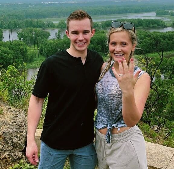 Chelsea and Jake got engaged on Barn Bluff, a favorite hiking spot of theirs that looks over the city of Red Wing. 