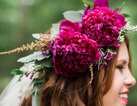 Maroon peony flower crown with a short hairstyle and veil