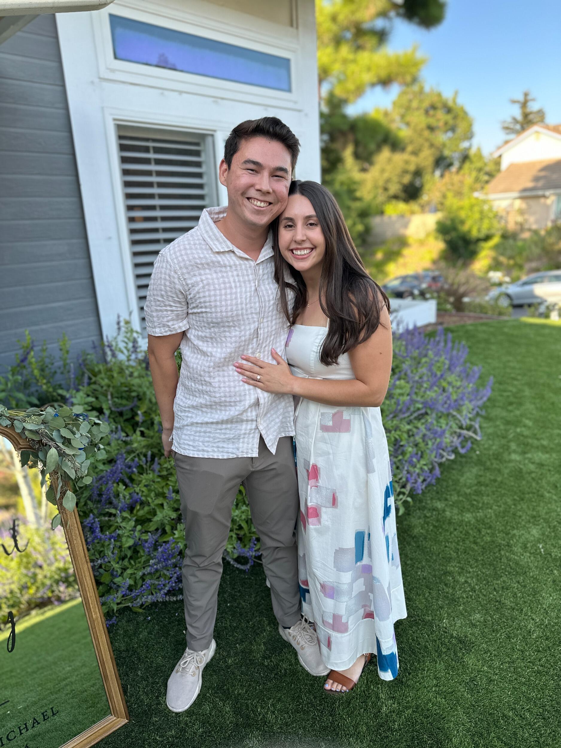 Celebrating with both of our families at our engagement party