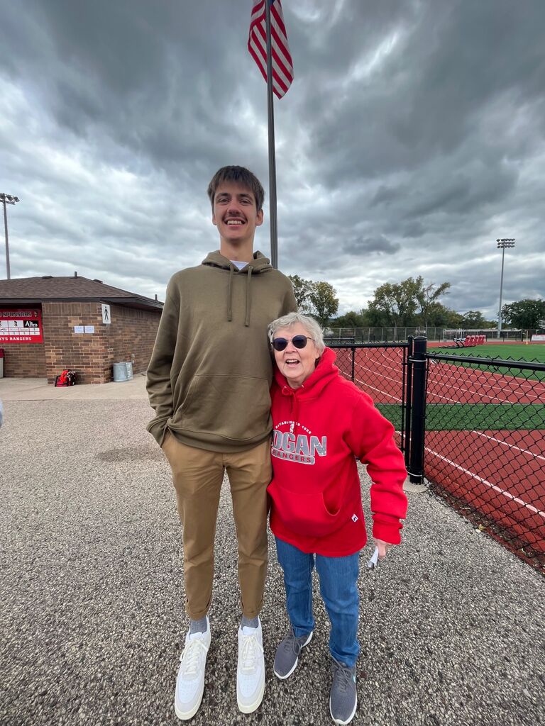 At Solomon's soccer game...Zach and Grandma showing their height difference!