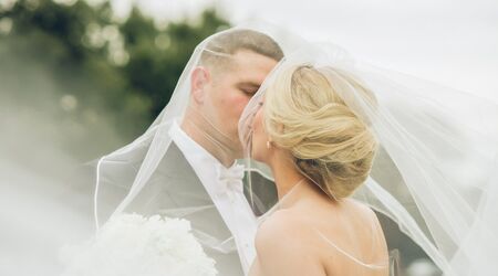 First Kiss Wedding Photos  Eivan's Photography & Video