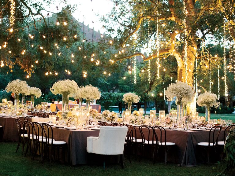 Hanging lights over outdoor wedding reception