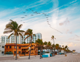 Empty beach in Hollywood, Florida at sunrise