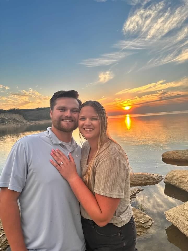The most perfect day!! Braydon had a few hiccups along the way with the ring and getting the spot set up, but it still turned out AMAZING! We went to dinner at Little's in Pick City before a pontoon ride with Joey and Angie. They dropped us off at a sandbar and Bray walked me over to a beautiful set up with a table, flowers, champagne and a note to read. As I finished reading it, he got down on one knee and asked if I would spend my life with him. It was an immediate yes :)