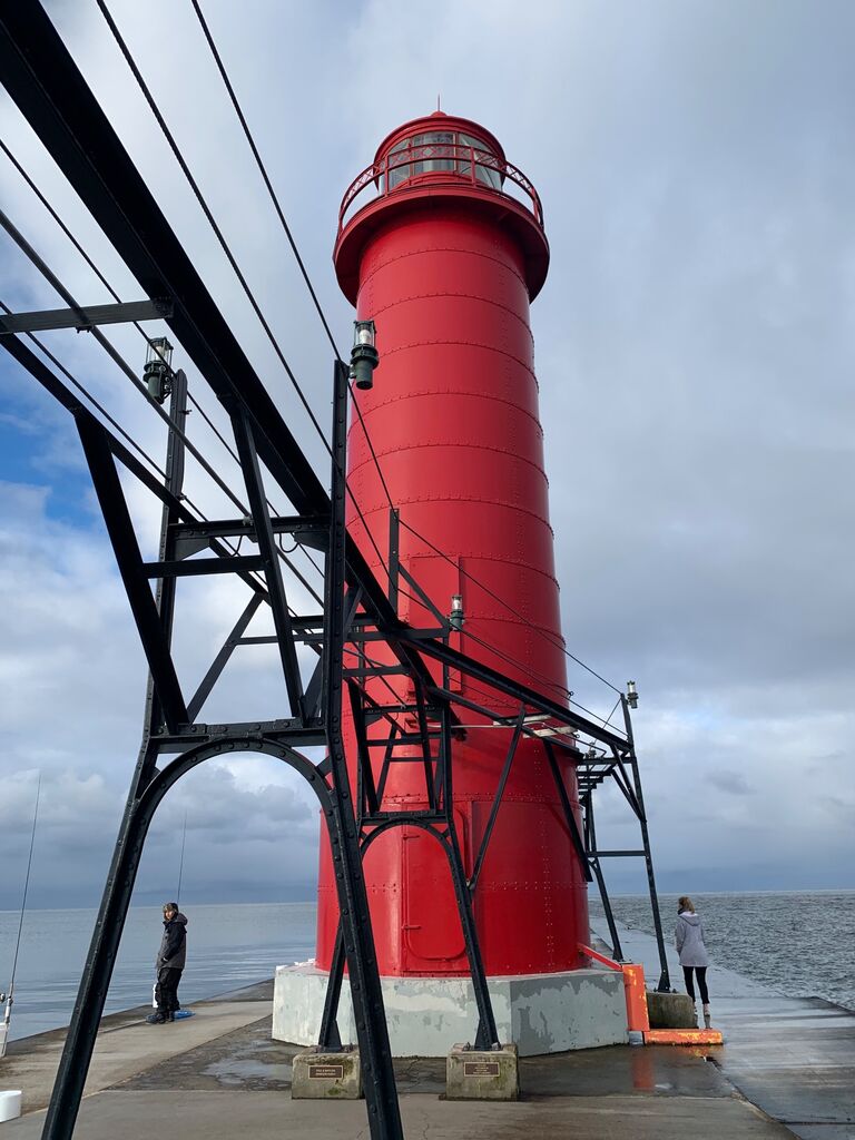 We went on our first trip together to Grand Haven, MI. Little did we know three years later we would get engaged in this exact spot.